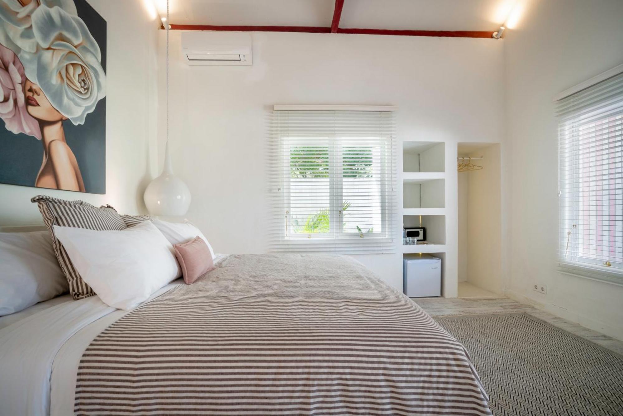 Ria Uluwatu, Tropical Chic Couette-café